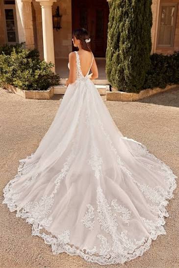 Back view of the plunge v-back Sebastian by Sophia Tolli Ball Gown wedding dress in lace and tulel at NKIN bridal boutique in Ottawa
