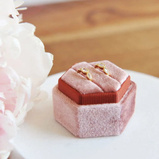 Olivia huggie hoops in a pink ringbox