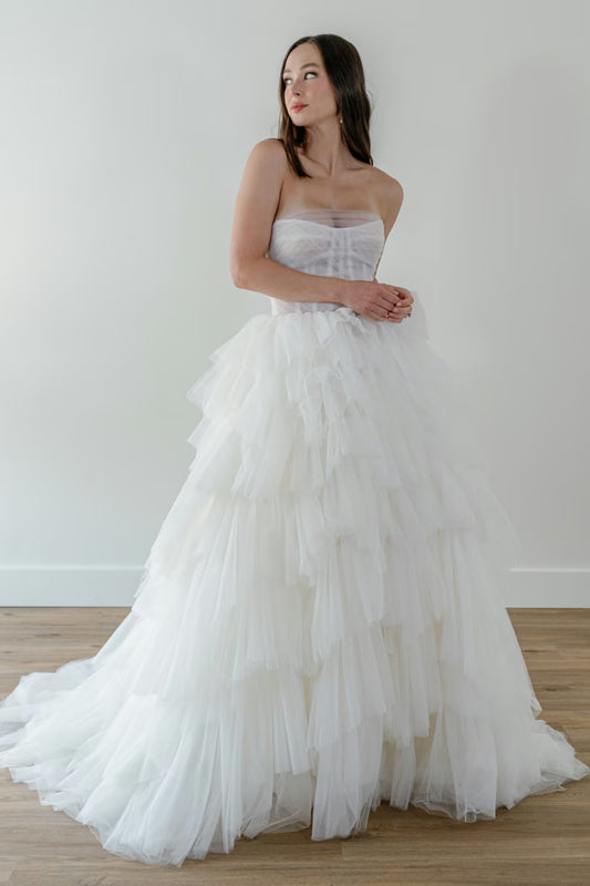 Crafted with love from playful tulle and matte organza, this gown is all about having fun while looking fabulous