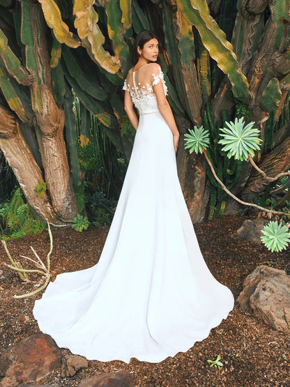 Full body back view of Masurian by Pronovias