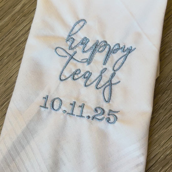 Video of a happy tears blue and white handkerchief