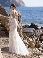 Full body back view of Romulea by White One Bridal 