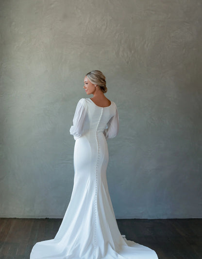 Full body back view of Amelia by The Modest Bride