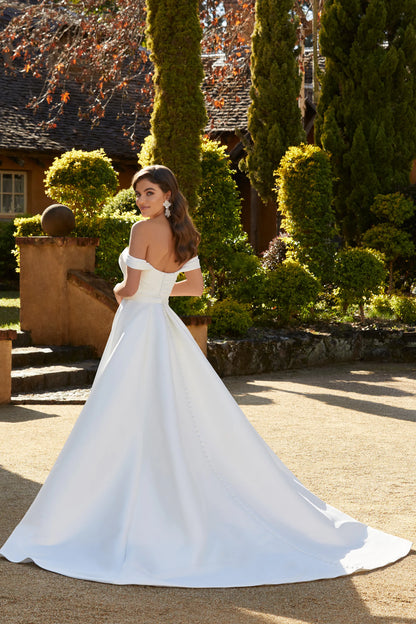 Back of Zendaya by Sophia Tolli is a fit and flare sweetheart wedding dress in mikado with a detachable overskirt at NKIN bridal boutique in Ottawa