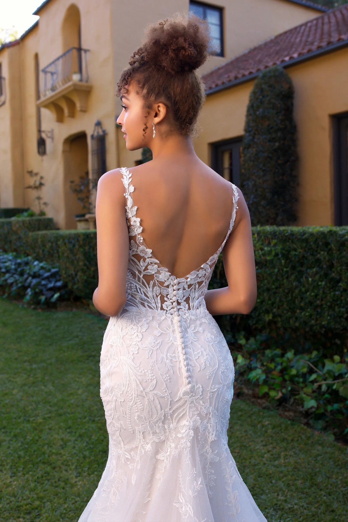 Low back of Jackson by Sophia Tolli fit and flare glitter tulle and lace wedding dress at NKIN bridal boutique in Ottawa