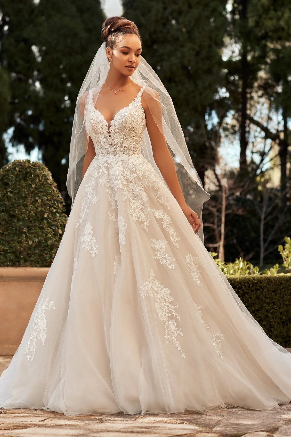 Model wearing the V-neck wedding dress, pierson by sophia tolli lace, in champagne and ivory available at Never Knew I Needed Bridal Outlet in Ottawa
