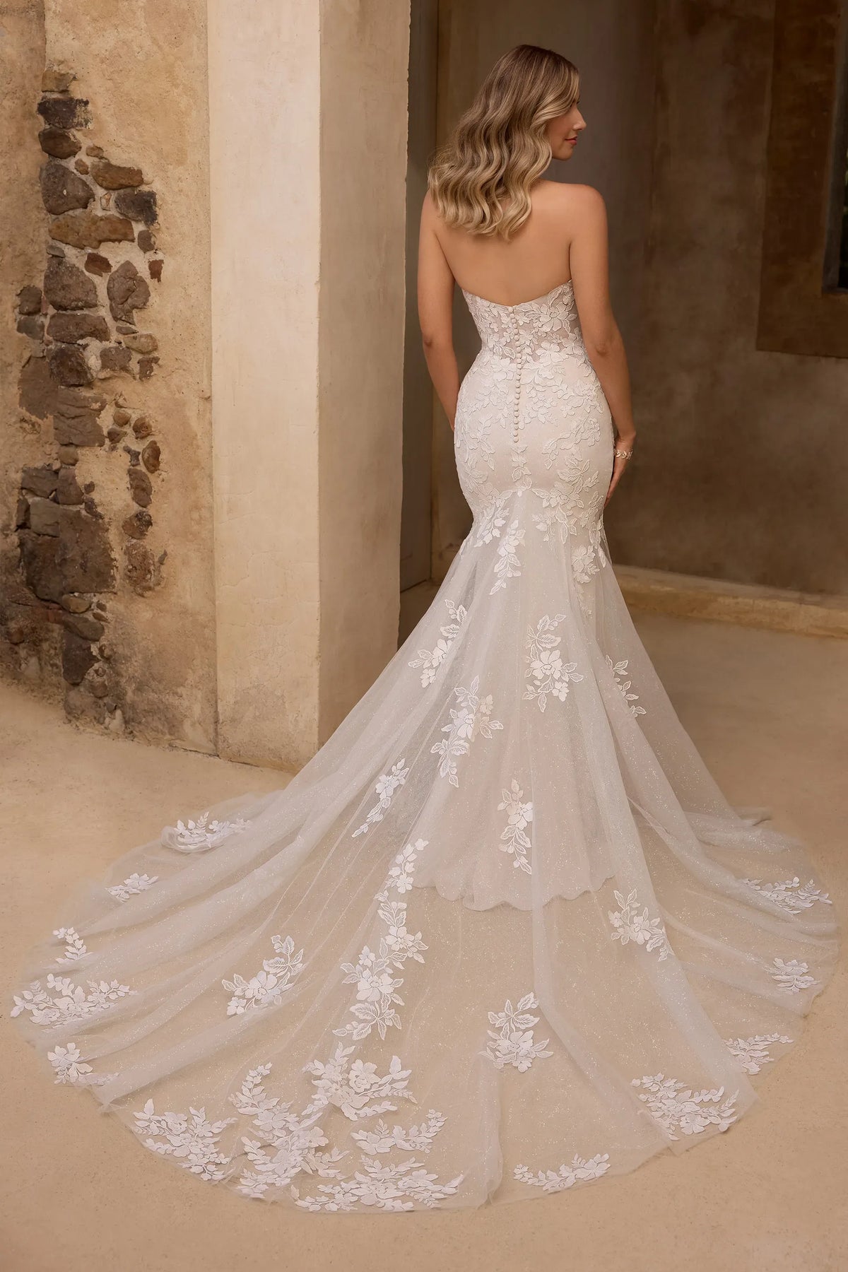 Back of Lulu by Sophia Tolli mermaid fit and flair wedding dress at NKIN bridal boutique in Ottawa