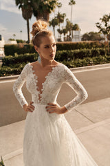 Closeup of model wearing Elly Bride Shirley low plunging neckline