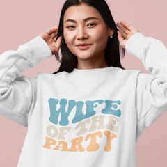 A young asian woman wearing a white crewneck with 