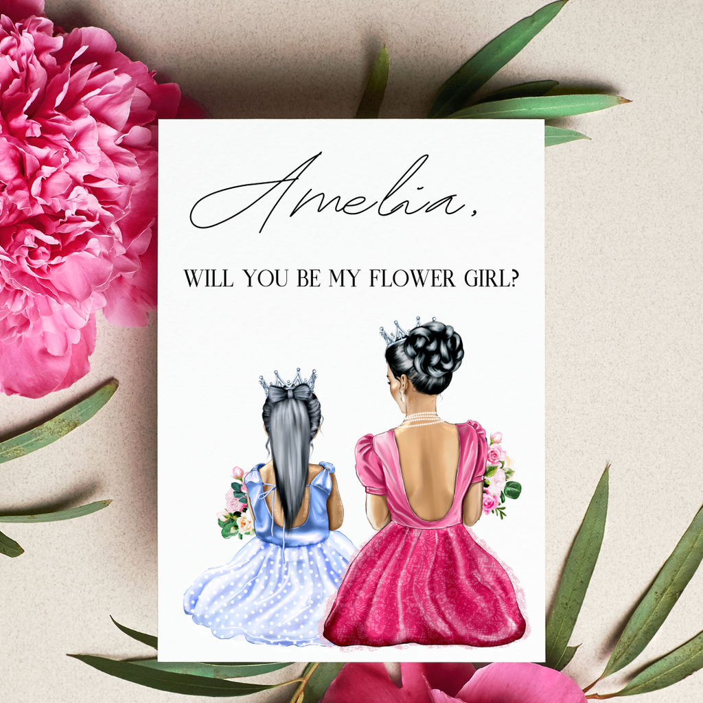 Lay flat of card that says - "Amelia, will you be my flower girl?" And two people sitting in flowers.