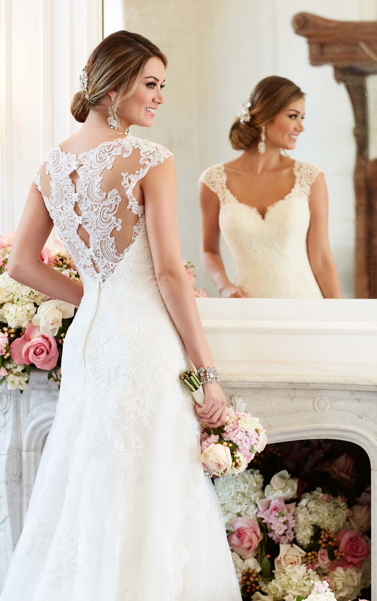 Ball gown wedding dress with lace and thick straps back view