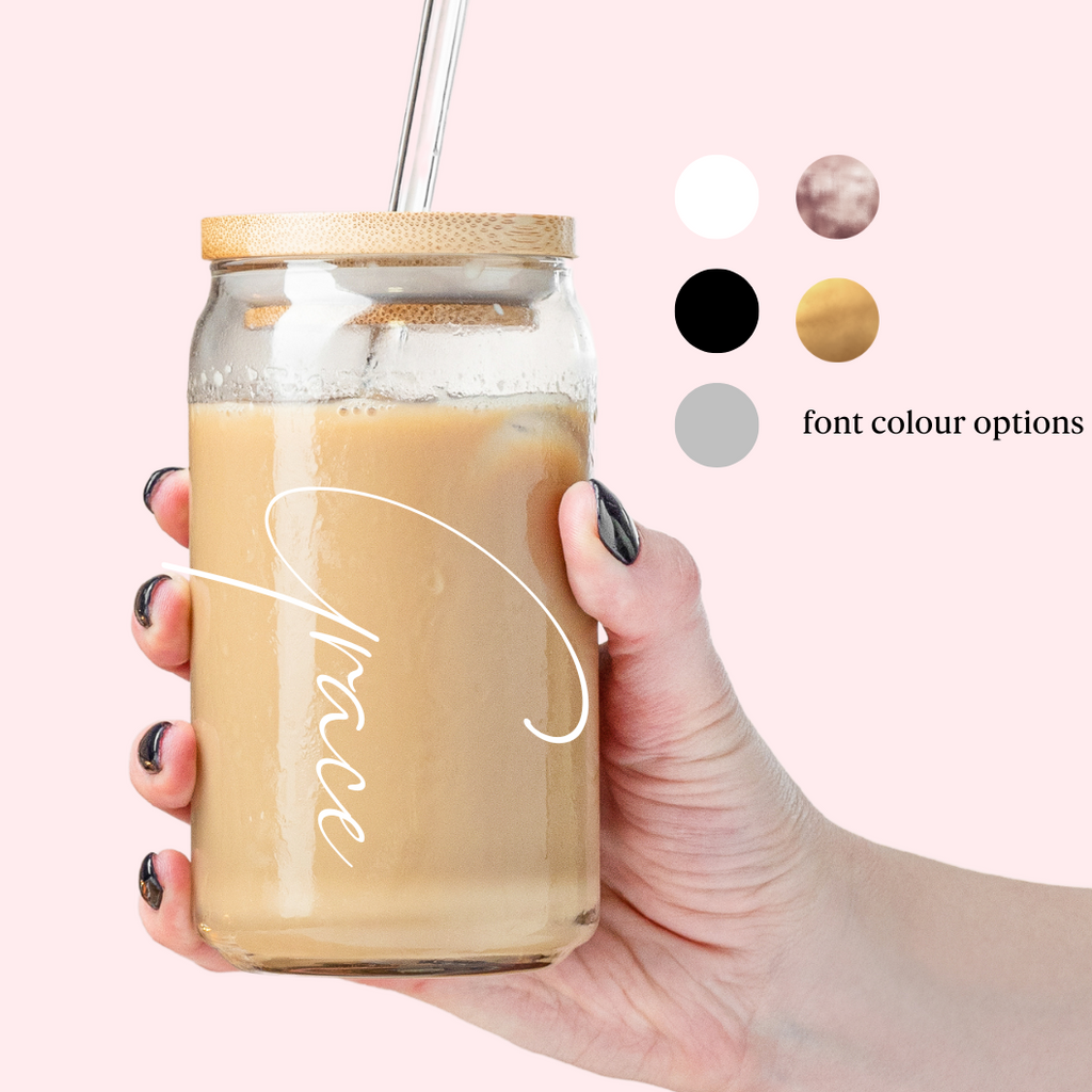 Minimalist coffee tumbler with "Grace" printed on it with coffee inside. 5 color options.