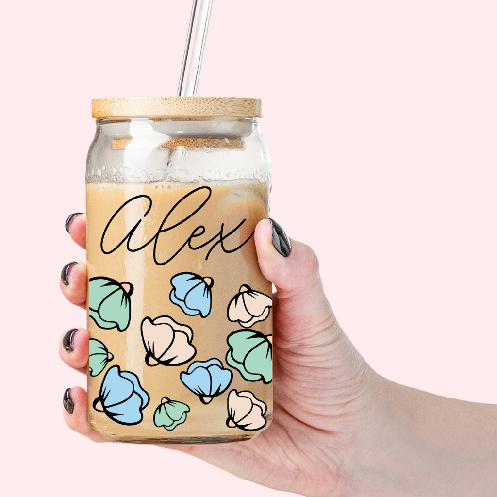 Glass tumbler printed with Alex and pastel flowers.