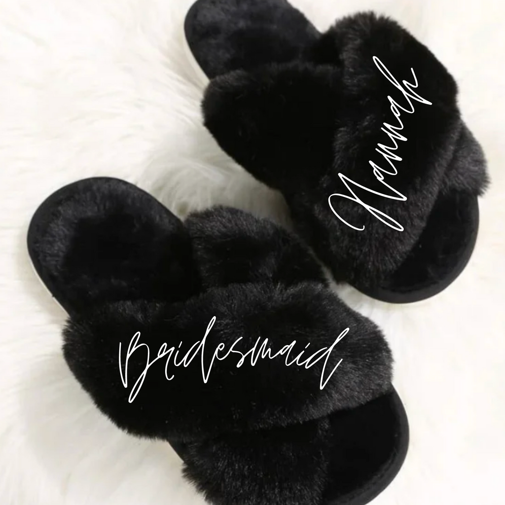 Custom fuzzy black slippers with "bridesmaid hannah" written