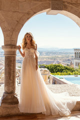 Frontview of Belle by Elly Bride showing off the lace bustier top and chapel length train