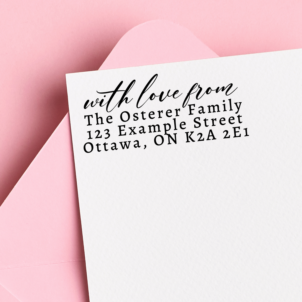 With love from written in cursive, stamped on a white envelope. Fake address written in block letters. Set on a pink background. A great custom housewarming gift!