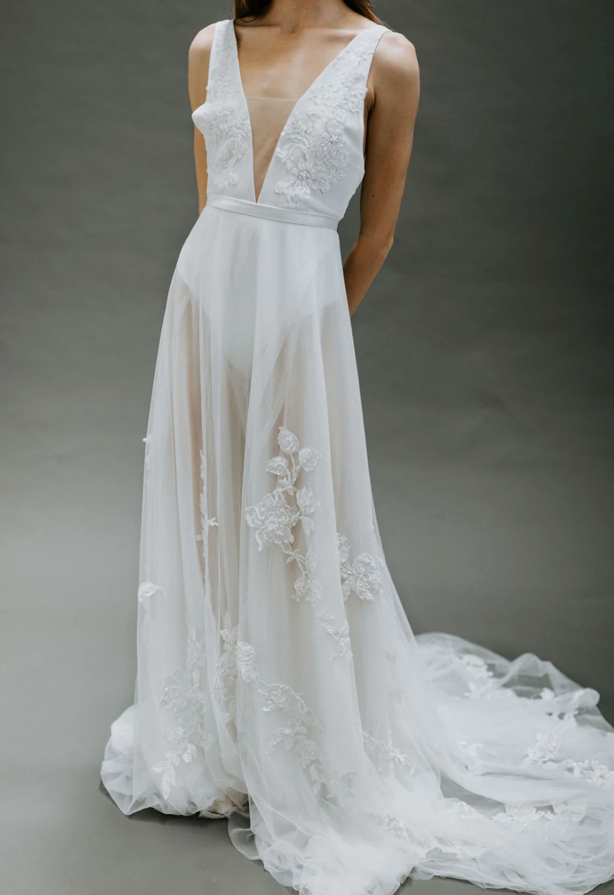 Overskirt made with lux soft tulle hand embellished with lightly beaded lace appliques. 70″ long