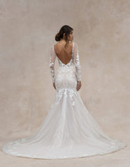 Model showing off the back of Vesper by Tara Lauren, Soft fit to flare long sleeve tulle gauze with lace appliqué detail