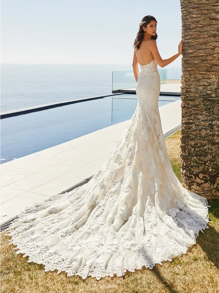Full body back view of desi by pronovias