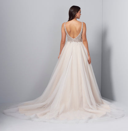 Woman wearing a ball gown wedding dress with a deep V and beaded top back view